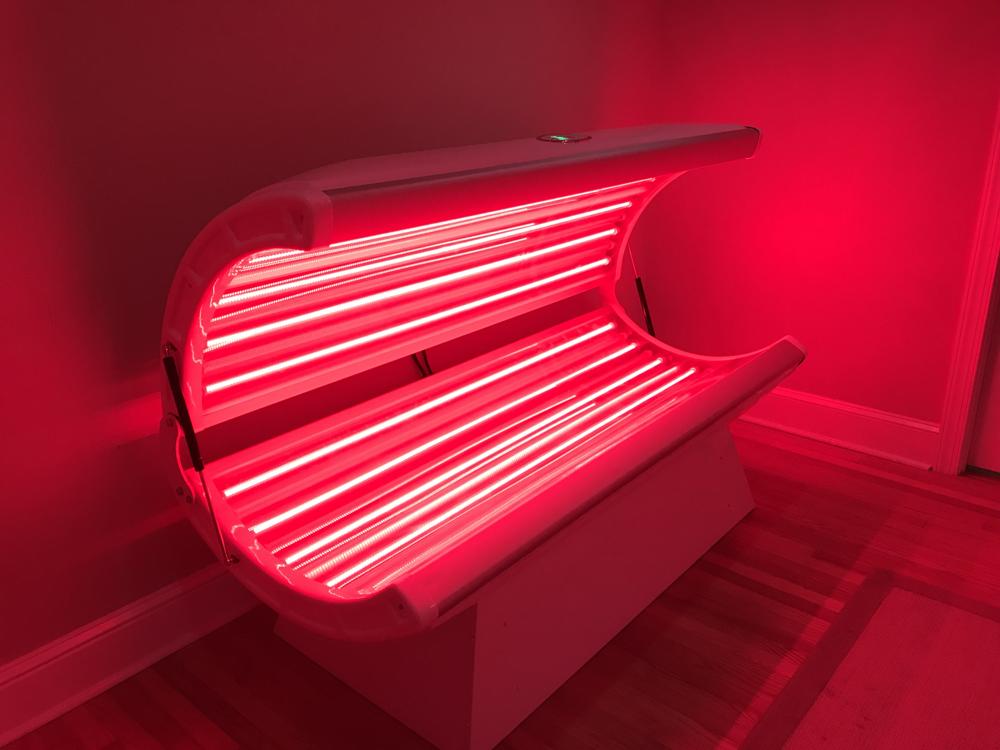 Whole-body red light bed at SoftWave Charleston